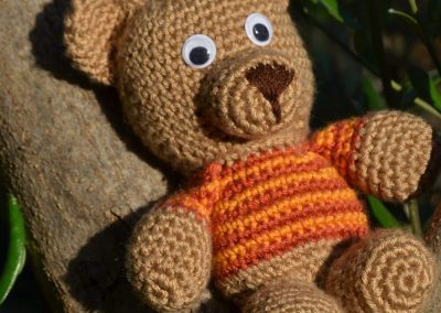 Crochet little bear with a stripe sweater